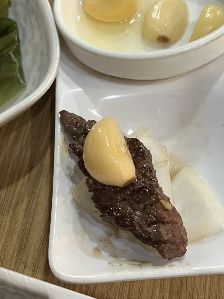 A golden-grilled piece of hanwoo galbi