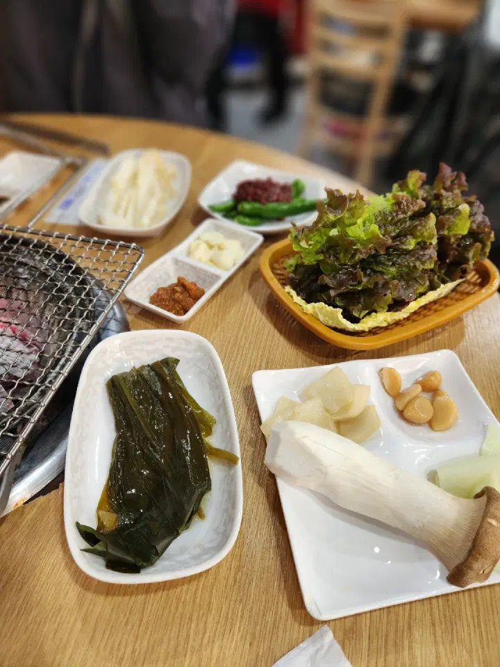 Coarse salt, soy dip, and side dishes