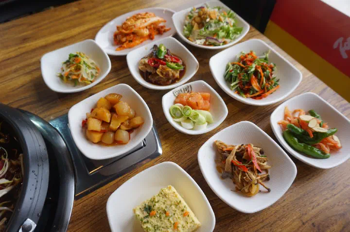 An assortment of Korean side dishes at Pungjeong Bulgogi