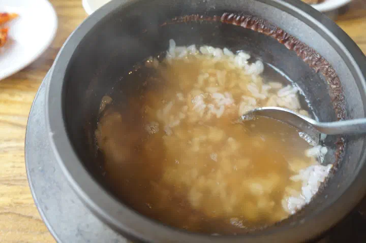Sungnyung, scorched-rice tea made in the stone pot