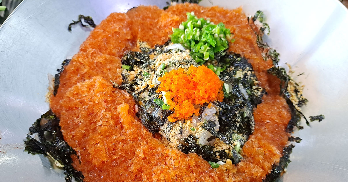 A bowl of mulhoe with iced broth at Myeongpum Mulhoe in Gijang