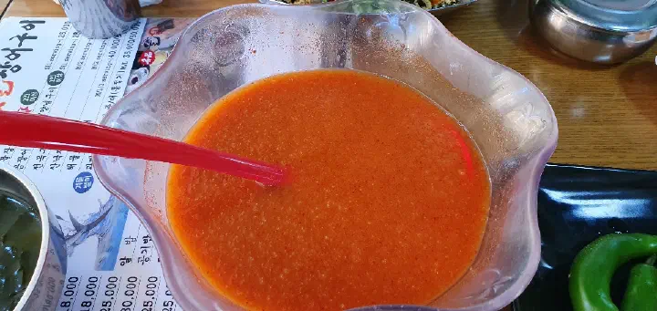 Ladling the iced broth