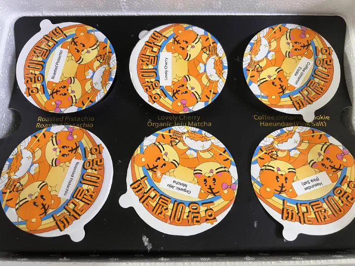 A 6-piece Horangi Jella Tteok set in tiger-print capsule packaging inside a cold-pack box