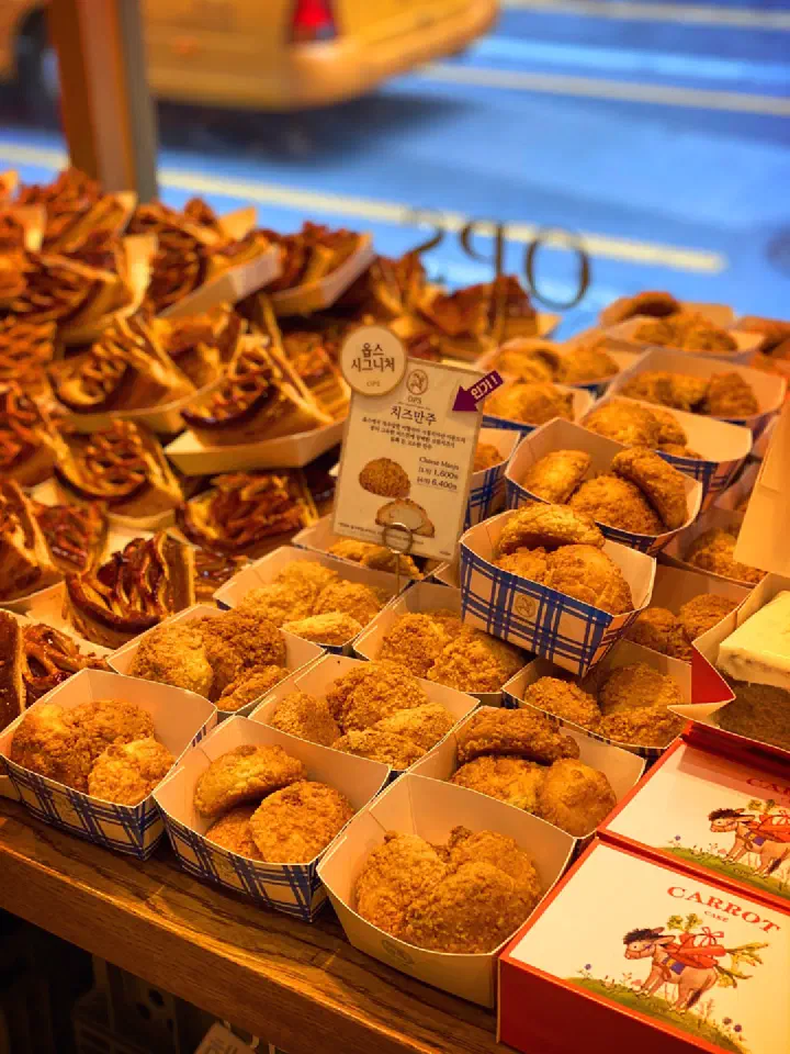 OPS signature cheese manju almond biscuits and apple pie slices in paper trays