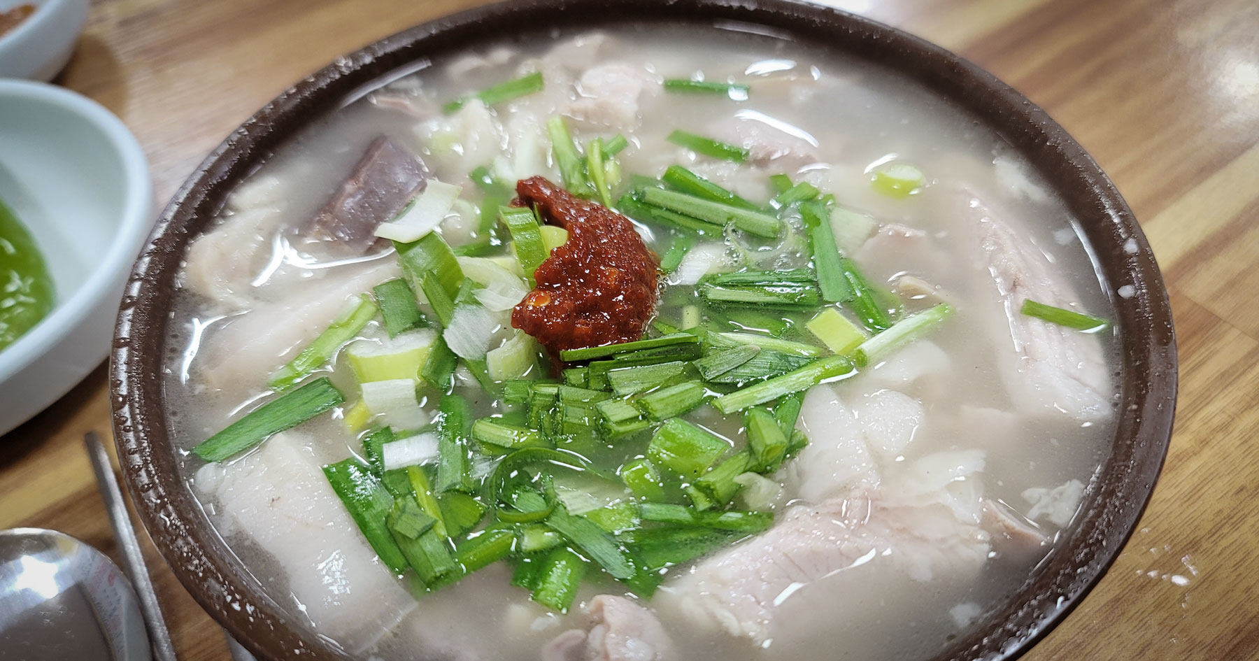 Gogi-bap pork plate with separate broth and rice at Shinsongja Sinmasan Sikdang