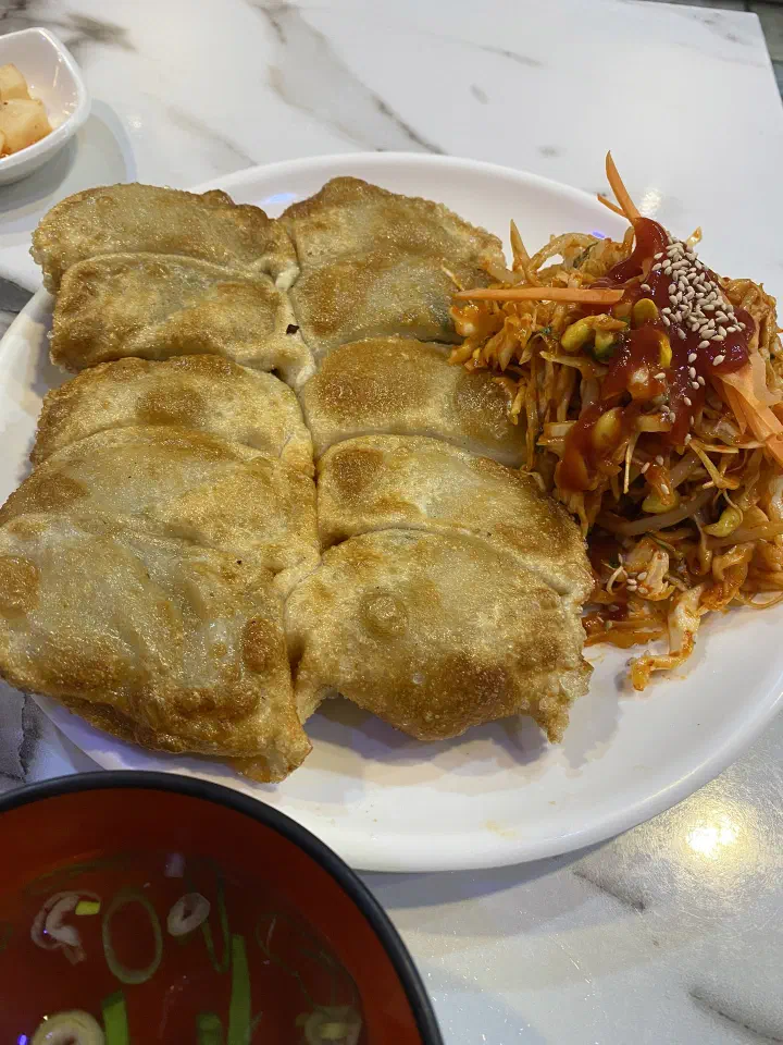 Taesan Mandu signature bibim-gunmandu, crispy fried dumplings served with sweet-spicy seasoned vegetables