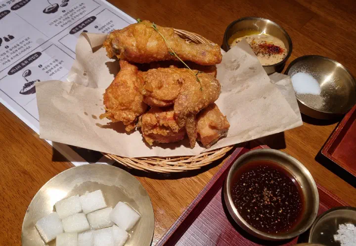 Basket of memil chicken with the house perilla oil mayonnaise dip, salt and pickled radish
