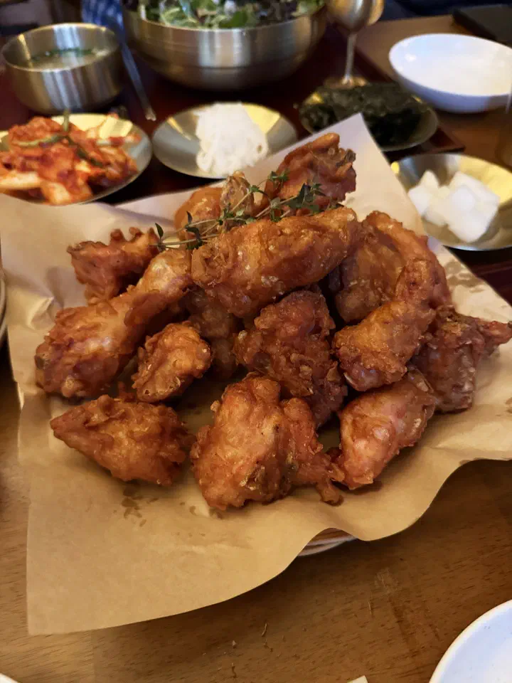 Close-up of memil chicken at Apgujeong Sanghoe, buckwheat-battered fried chicken pieces with a thin crisp crust
