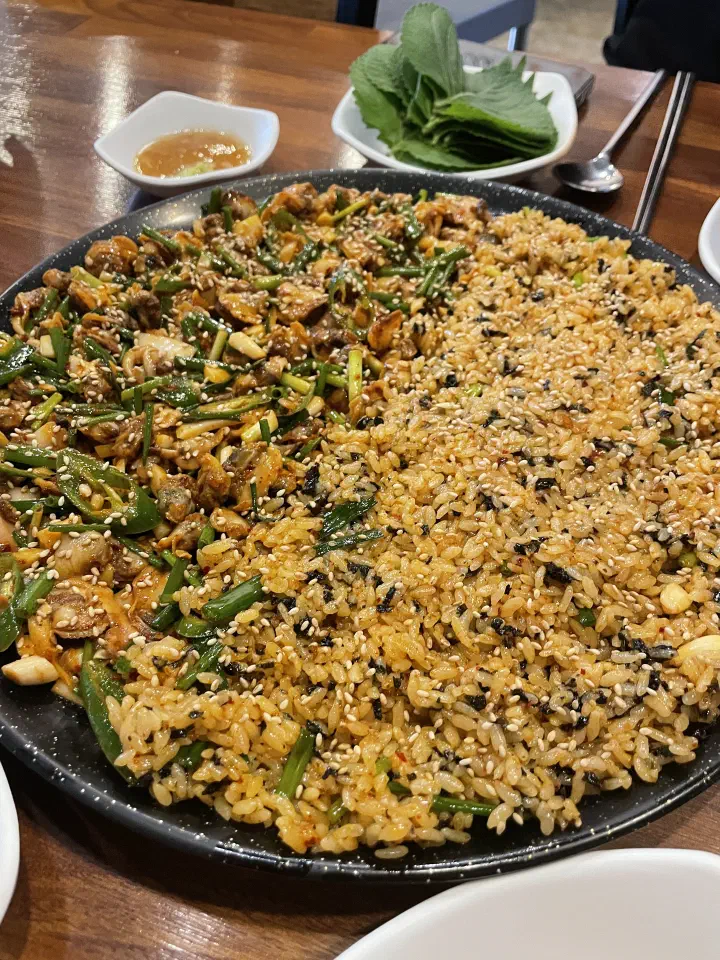Dokdone’s cockle plate served with a bowl of perilla leaves and sesame oil dip