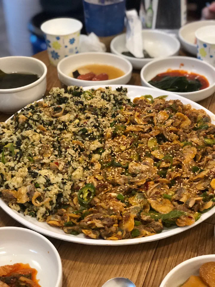 Seasoned cockles and cockle rice bowl split across one large plate at Dokdone