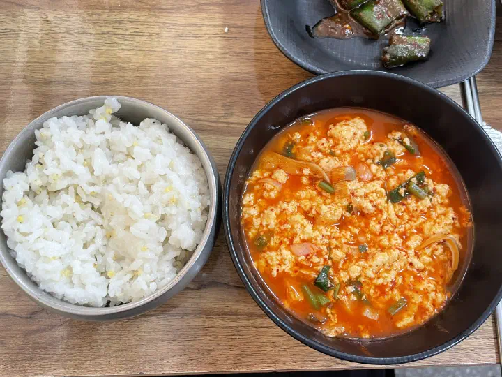 Sundubu baekban soft tofu set meal served with rice at Gunammae Dubujip