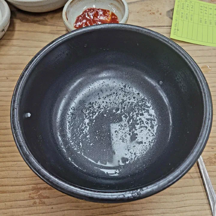 A bowl engraved with the restaurant&rsquo;s name