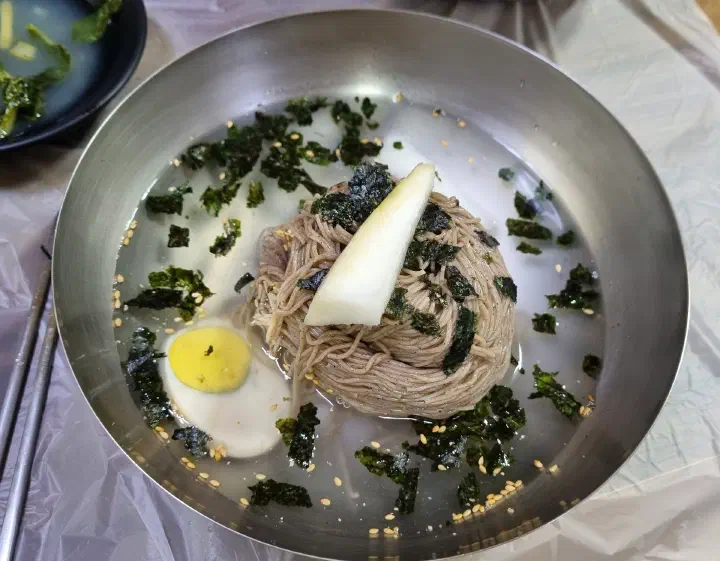 Baekchon Makguksu cold dongchimi mul-makguksu with radish, laver, and thin ice broth