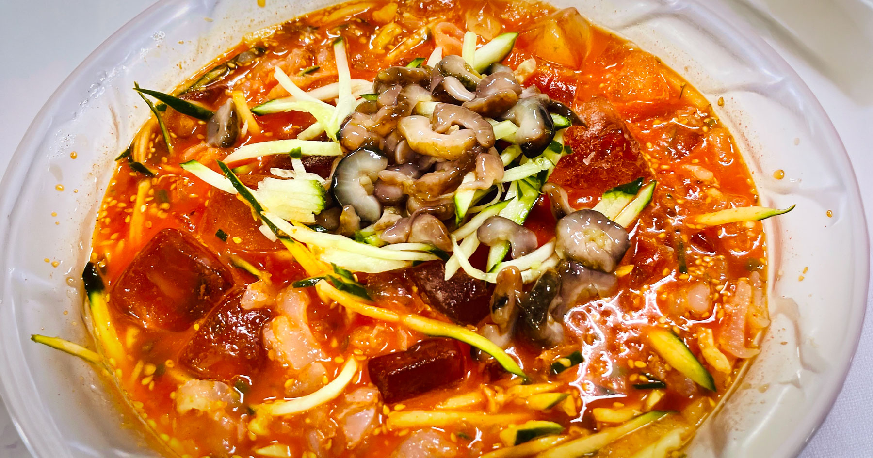 A bowl of mulhoe with flatfish sashimi at Gwangbeomine Hoetjip