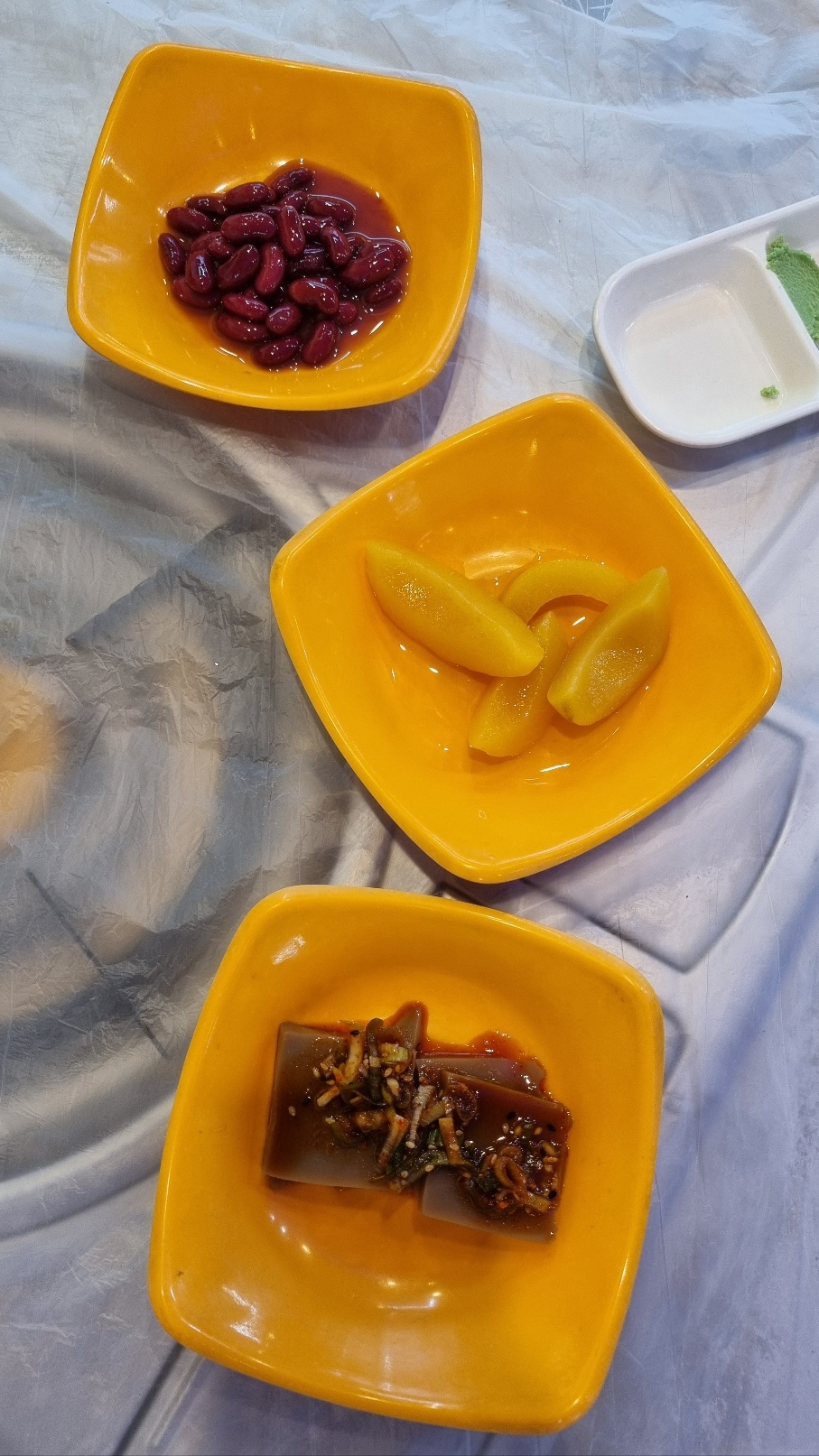 Small Korean side dishes served at Haejeoksusan