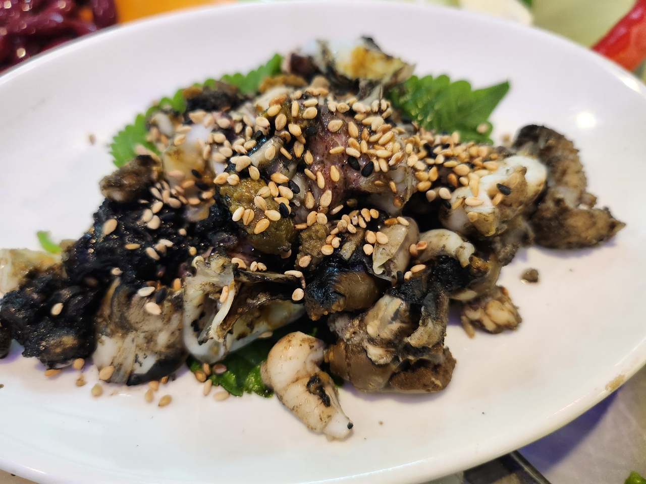 Squid mulhoe, cold sweet-and-tangy raw fish soup