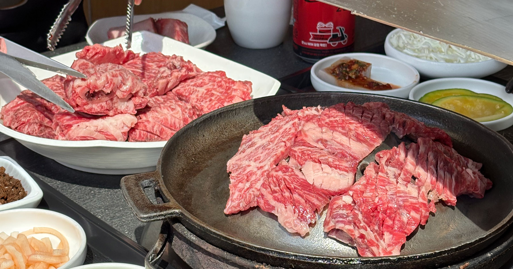 Korean beef short rib grilling over charcoal at Haeundae Amsogalbi-jip in Busan