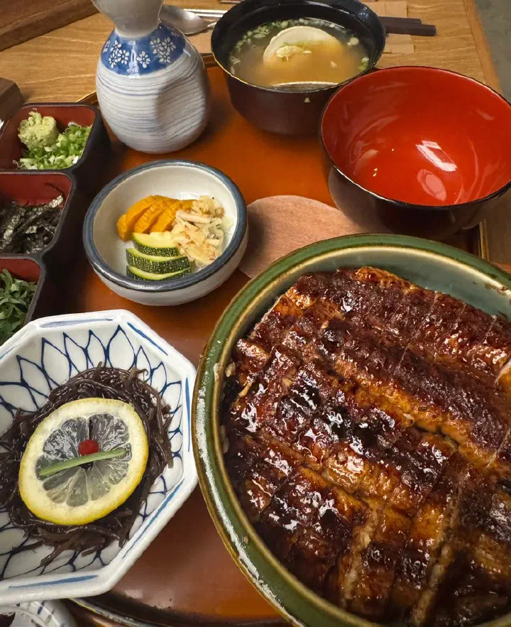 Grilled eel box tray with side dishes and miso soup at Haemok, Haeundae