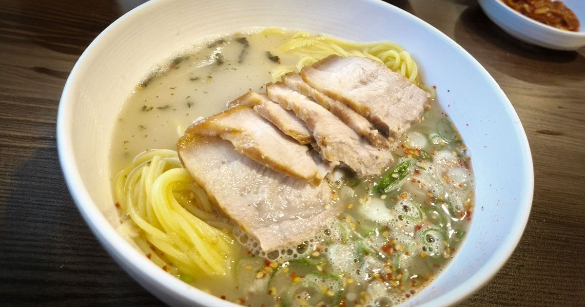 Jamae Guksu pork noodle soup with sliced pork in Jeju