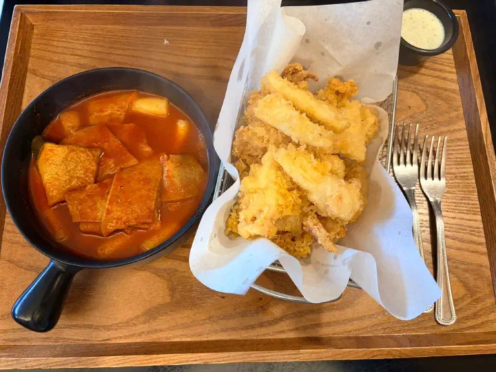 Two-person set at Pyeongdae Snack in Gujwa, Jeju - hanchi squid tempura and soupy tteokbokki