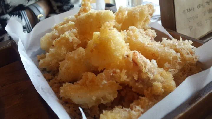 Close-up of Pyeongdae Snack hanchi squid tempura with its crunchy batter