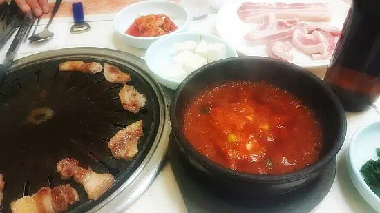 Bubbling mel-jorim anchovy stew served in an earthenware pot at Solji Sikdang