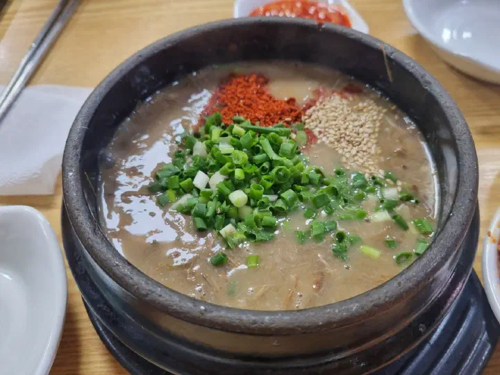 Close-up of Ujin Haejangguk&rsquo;s gosari yukgaejang, thick with finely shredded Jeju bracken fern