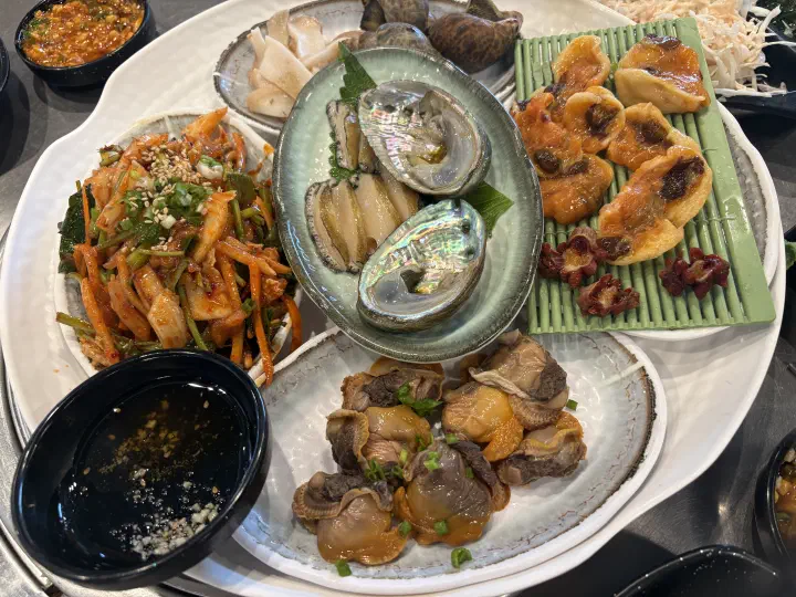 Assorted seafood with grilled clams and eel at Dongbu Hoe Center