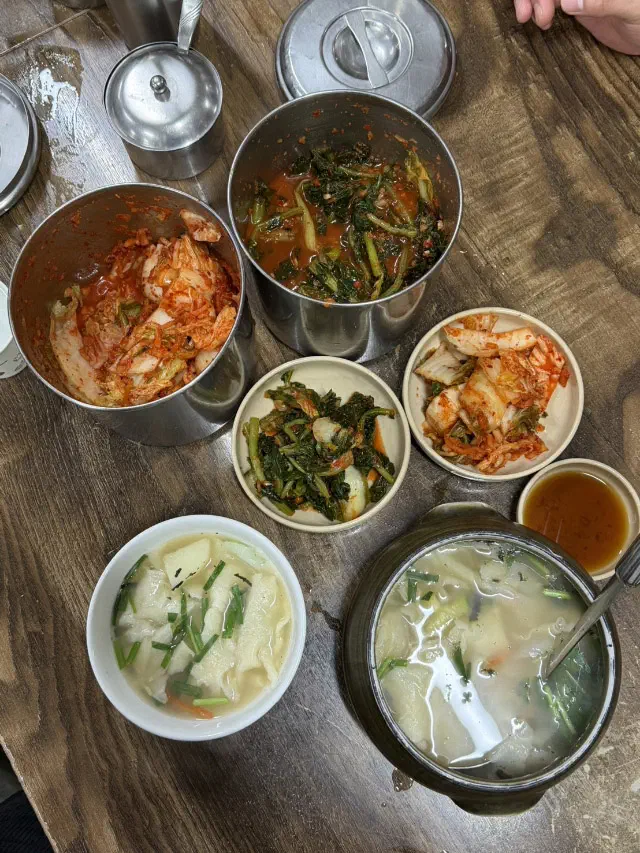 Napa cabbage kimchi and yeolmu young radish kimchi served as banchan at Samcheongdong Sujebi