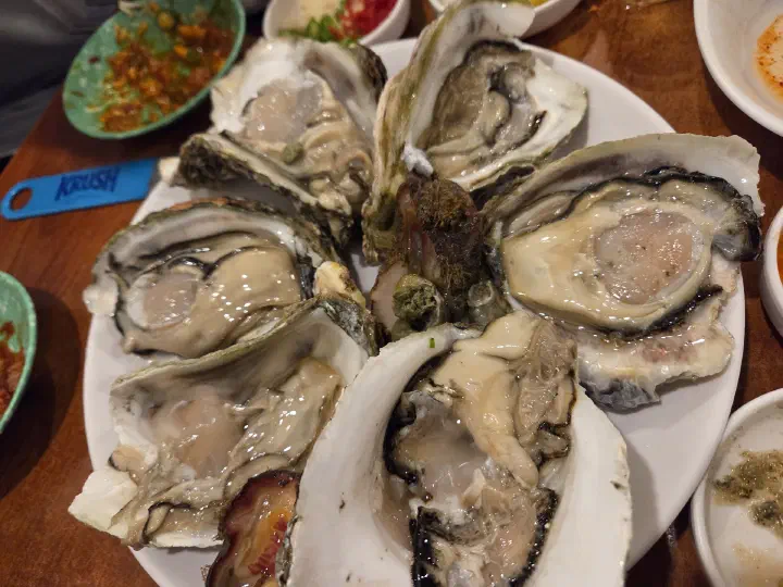 Giant rock oysters (bawidaegul) served on the half shell, a summer specialty at Seochon Gyedanjip