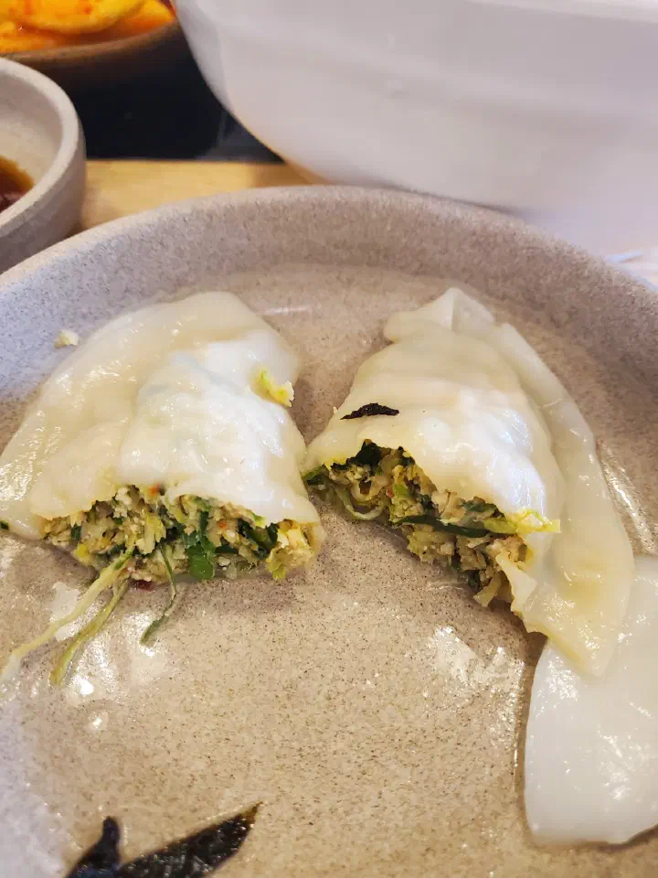 Generously sized hand-folded dumplings
