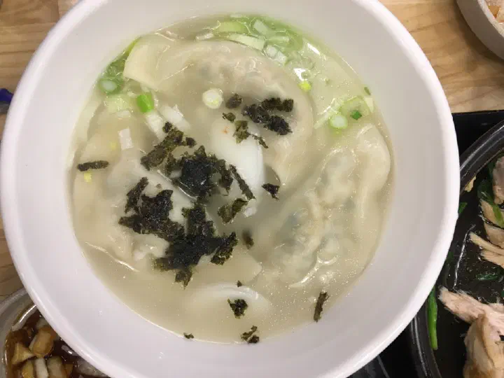Dumplings simmered in a beef-bone broth