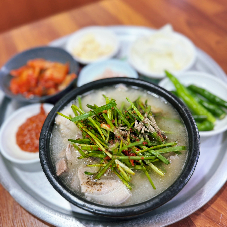 A clear, fragrant broth speckled with chives and pepper