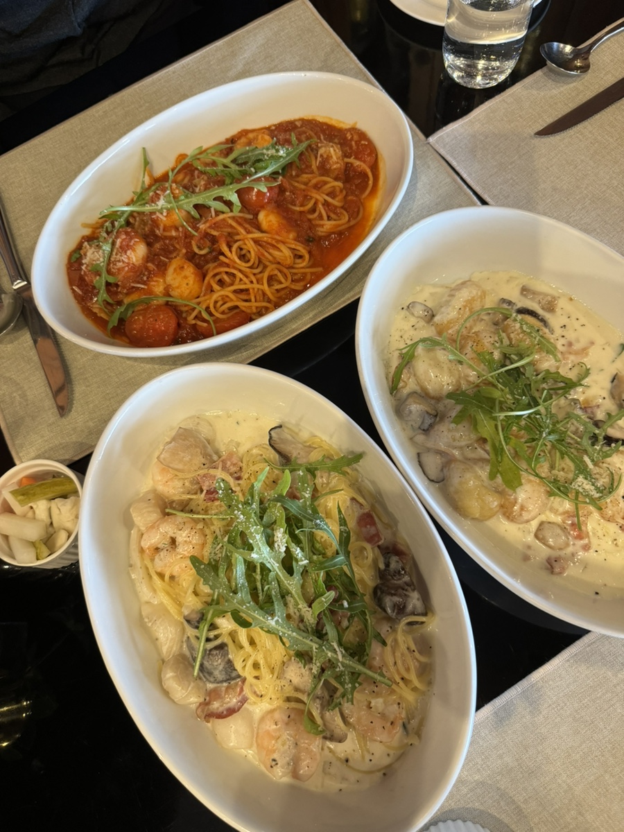 Three pasta dishes spread at O’Kim’s