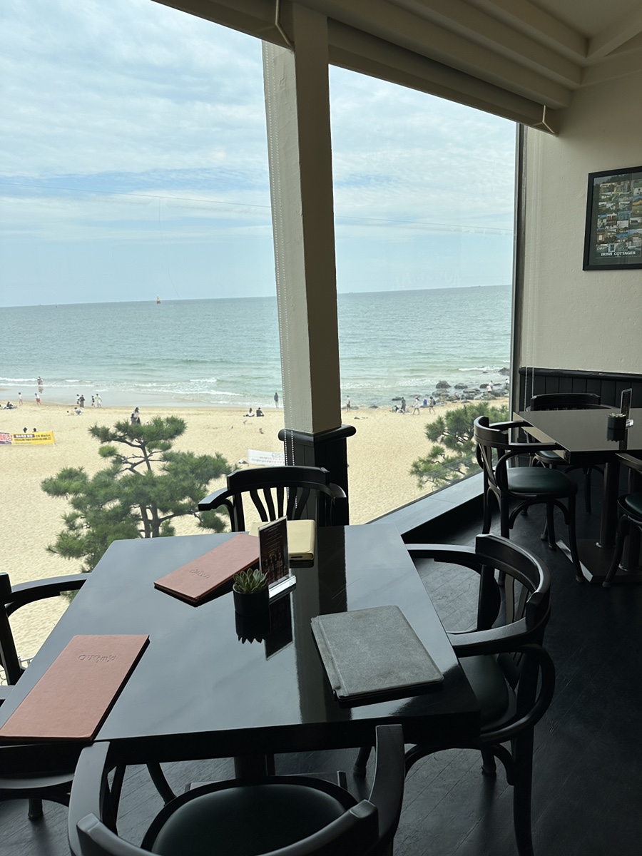 Window seat with beach view at O’Kim’s