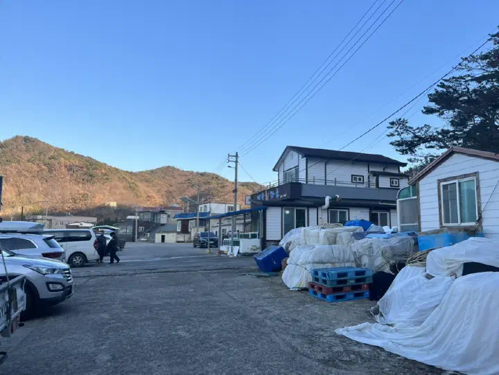 Seaside exterior and parking lot of Daegung Hoetown in Homigot, Pohang