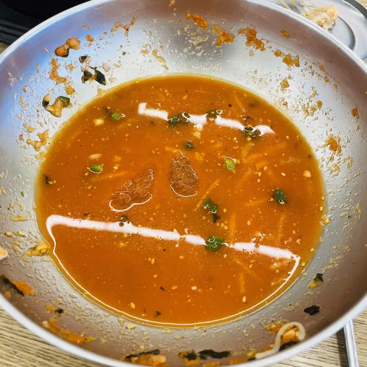 The free spicy fish stew (매운탕) that comes with mulhoe at Hwanyeo Hoetjip