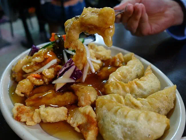 Old-school tangsuyuk with sauce poured over and crispy fried dumplings