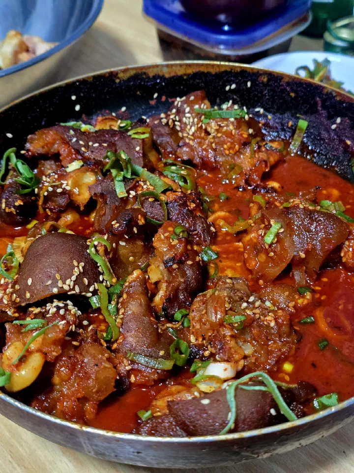 Close-up of maeun yangnyeom jokbal, spicy braised pig&rsquo;s trotters in red chili sauce