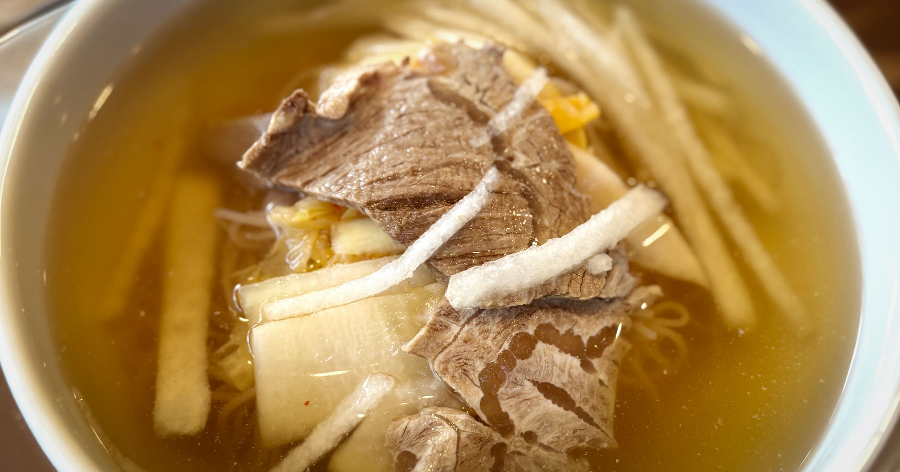 A bowl of Pyongyang cold noodles at Woo Lae Oak