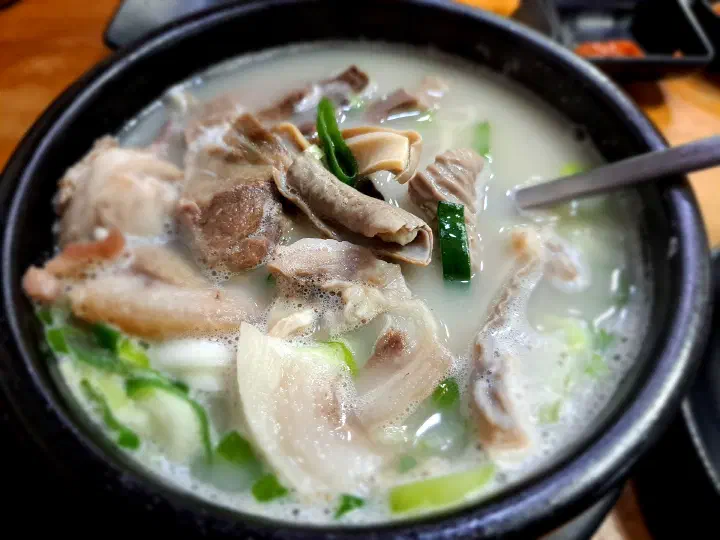 Close-up of the milky, long-simmered pork broth at Samgeori Meonjimak Sundaeguk