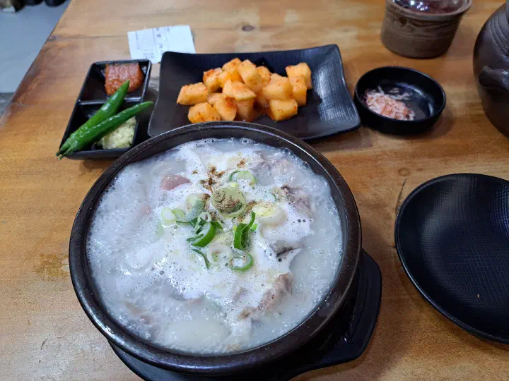 Sundaeguk table setting at Samgeori Meonjimak Sundaeguk with kkakdugi, salted shrimp and minced garlic