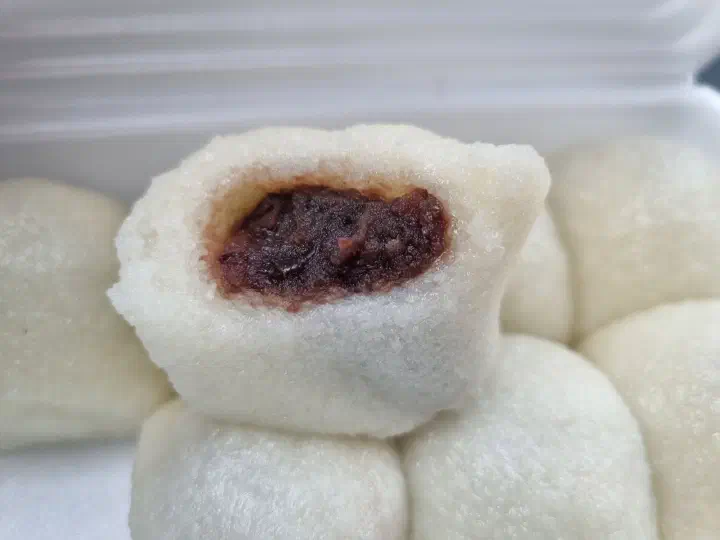 Close-up of the house-cooked red bean paste inside a Yukgu Bangatgan chapssal mochi