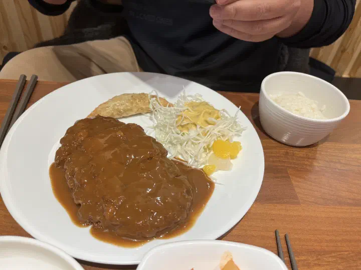 Cross-section of yeou tonkatsu filled with sweet potato mousse and cheese