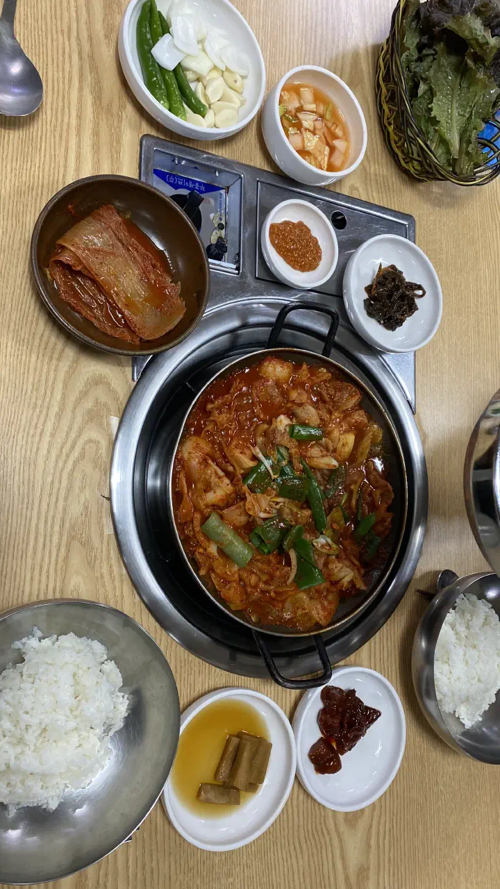 Generous banchan spread at Downmok Salgui Restaurant