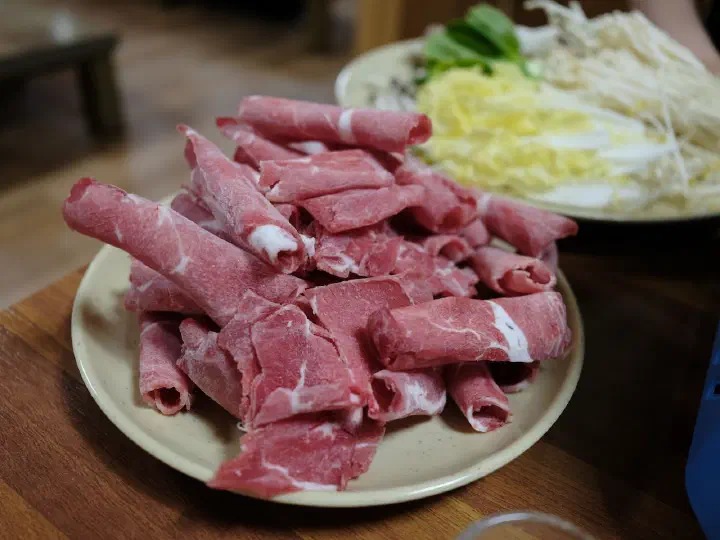 Plate of marbled beef for shabu-shabu at Cheonghakdong Eonyang Bonjeom