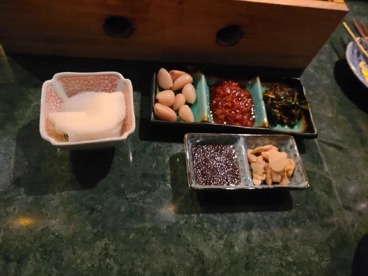 Banchan side dishes and dipping sauces at Eunsincheo