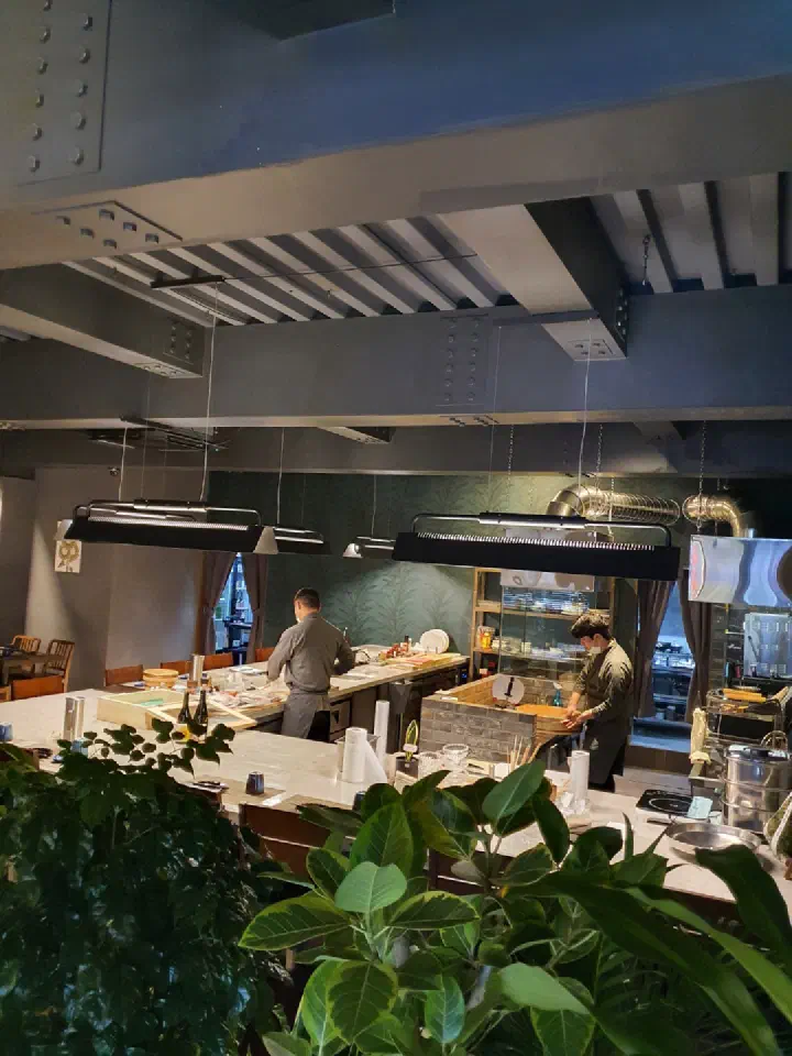Wood-toned dining space at Haebaragi