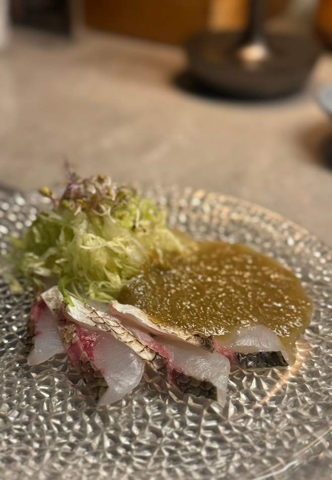 White fish sashimi with abalone innard sauce