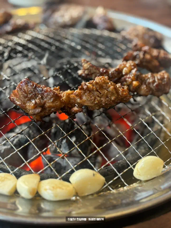 Galbi, tteokgalbi, and mushrooms ready to grill at Hangawi